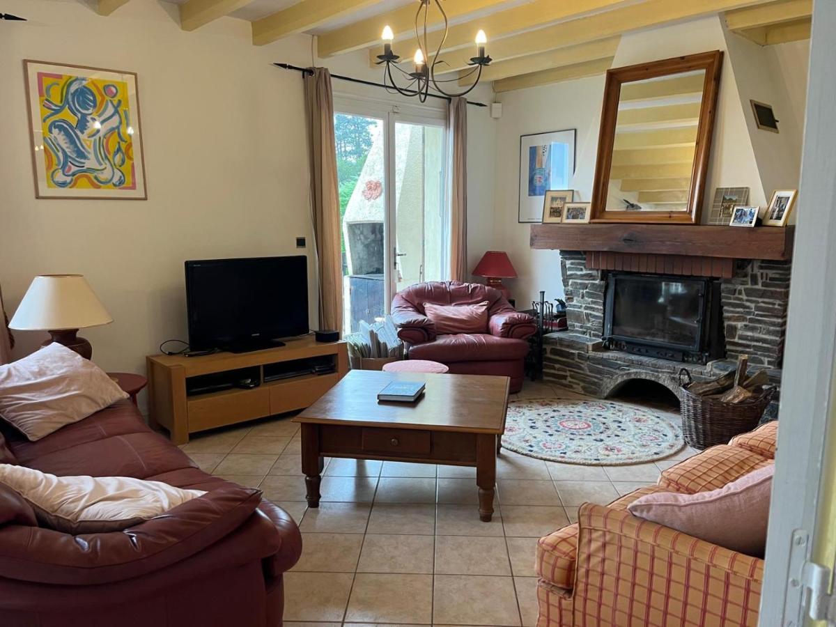 Second sitting room with wood fire and TV