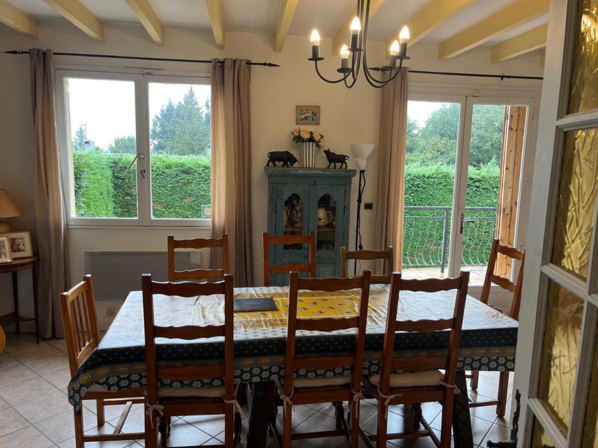 Dining table for eight, doors onto the balcony