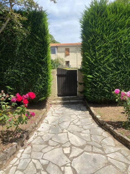 The garden gate and path to the house